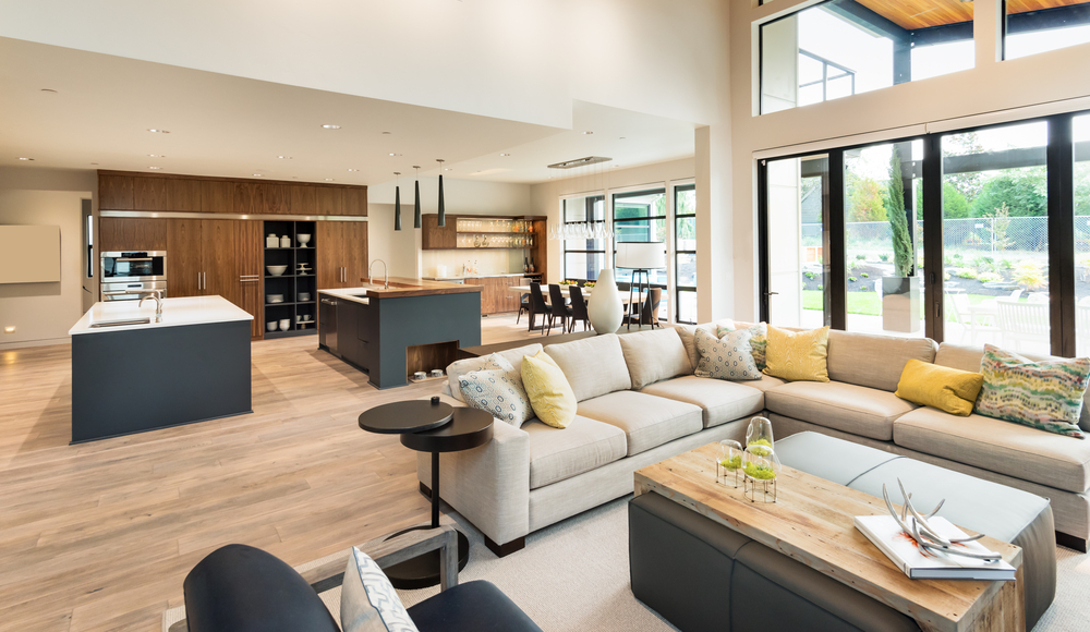 separate seating, tv, and cooking zones in room