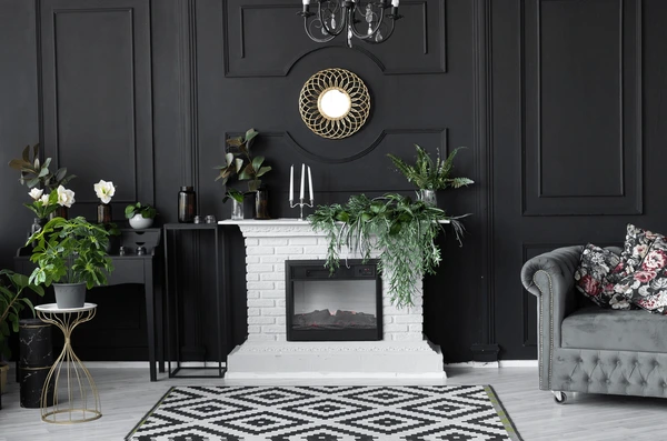 dark colored wall with gaudy accessories on chimney