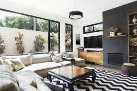 one wall in a dark color while the rest is white