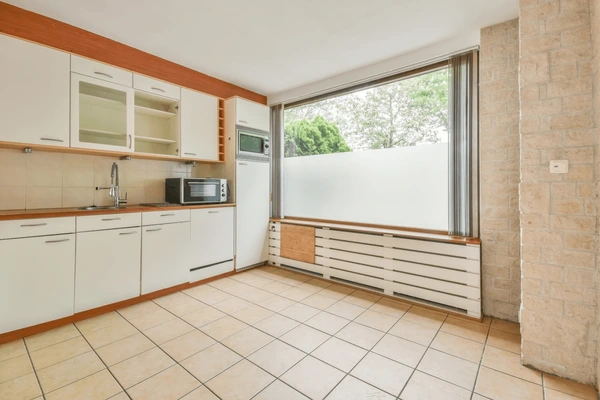 Beige Floor Tiles for Kitchens with White Cabinets